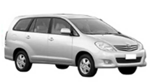 Silver Toyota Innova MPV parked outdoors